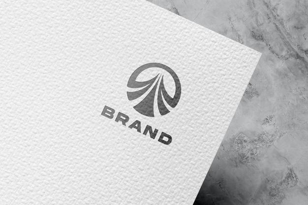 Embossed logo mockup on white paper