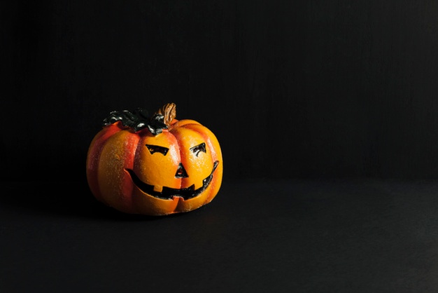 Halloween decoration with spooky pumpkin