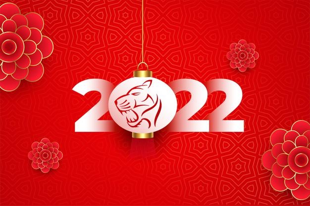 Realistic chinese new year 2022 card with tiger face and flowers decoration