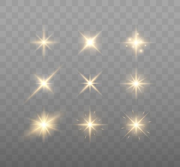 Set of shining sparkles and lens flares glowing lights isolated on transparent background vector ill...