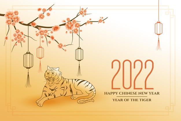 Traditional chinese new year 2022 card with tiger sitting under the tree